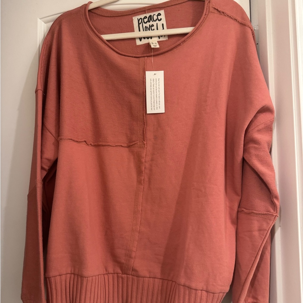 Peace Love World Coral Sweatshirt